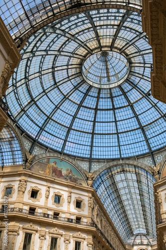 View of the glass dome at Galleria Vittorio Emanuele II  which is one of the world s oldest shopping malls  housed within a four-story double arcade in central Milan.