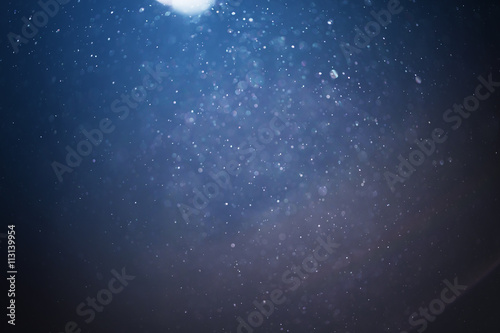abstract blue particles background natural bokeh