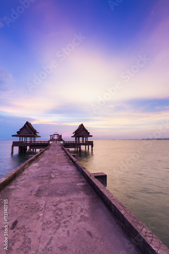 Canvas Print Walking path leading to the sea with twilight sky background