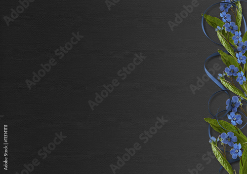 Flowers on black background - border of forget-me-not