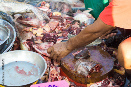 Fresh seafood on plate sale in fishery village market