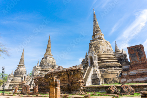 Ayutthaya Historical Park with Tree branch blue sky  Phra Nakhon