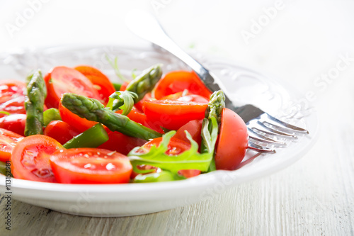 Fresh salad with cherry tomatoes and asparagus