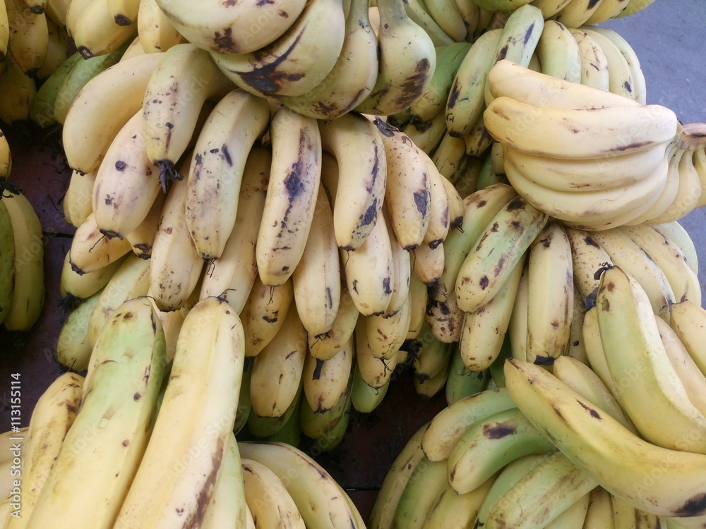 Directly above shot of fresh bananas for sale Directly above shot of fresh bananas for sale