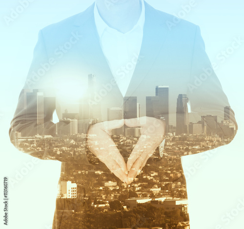 double expoure of businessman and cityscape photo