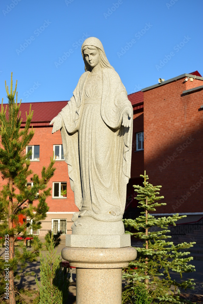Sculpture of Virgin Mary near Catholic church in Astana, capital of Kazakhstan