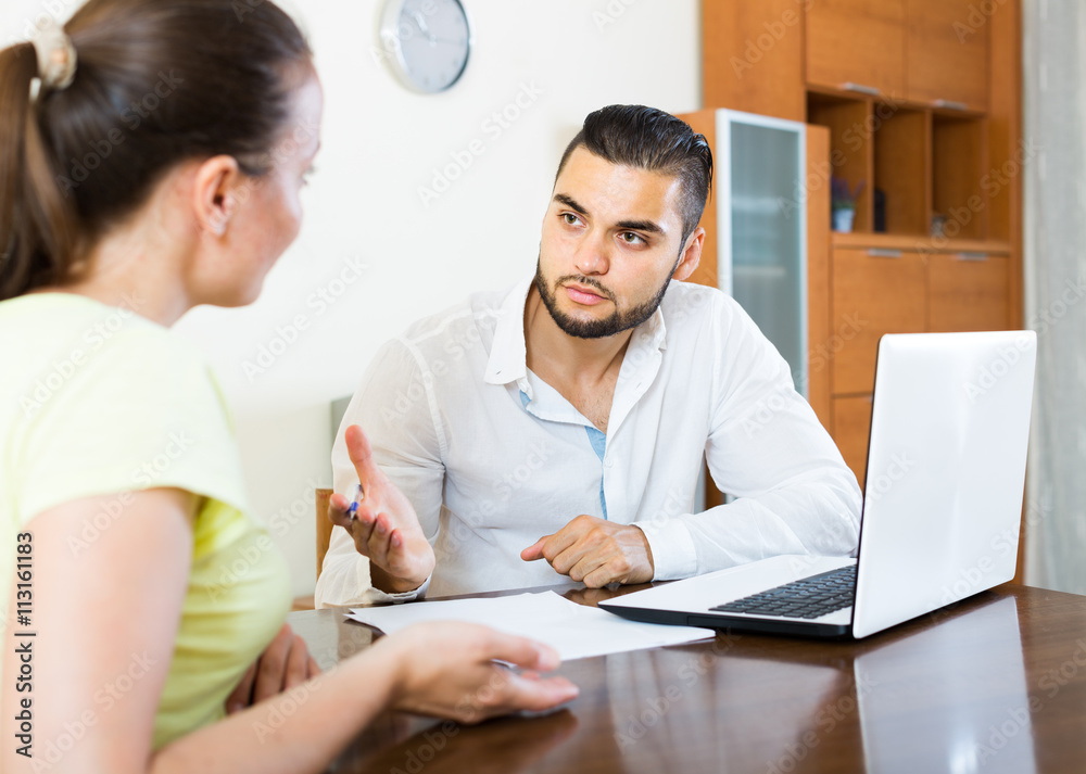 Obraz premium couple with documents in apartment