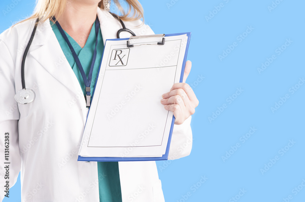 A doctor holding a medical prescription clip A doctor holding a medical prescription clip