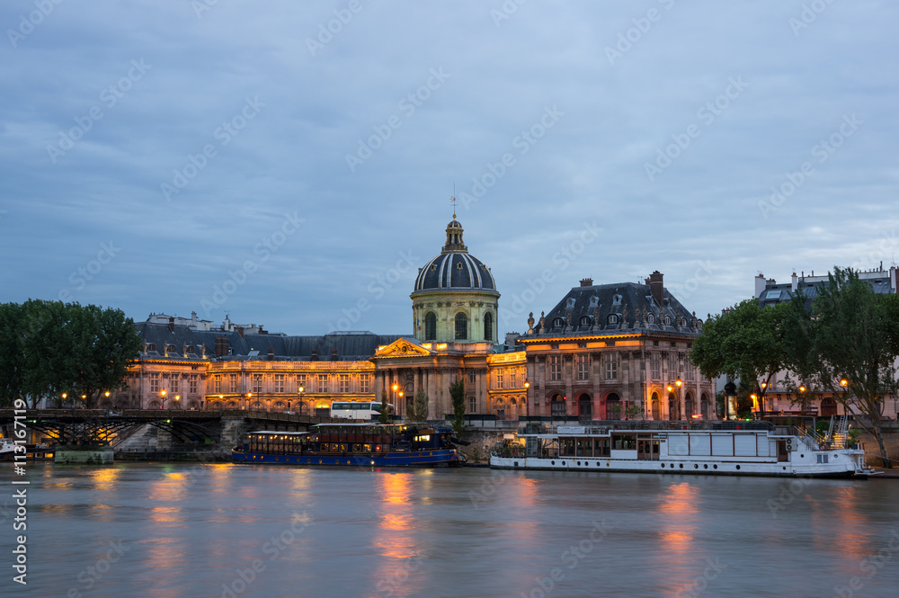 The French Institute and the Seine river at night
