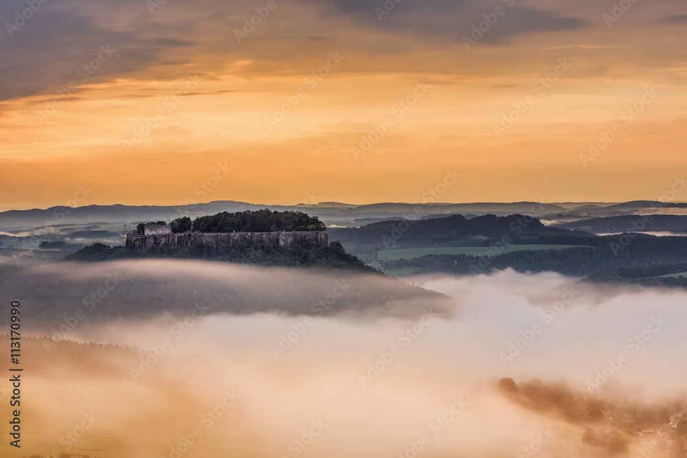 Sunset over fort Konigstein, view from Pfaffenstein in Saxony, Germany. Sunset over fort Konigstein, view from Pfaffenstein in Saxony, Germany.