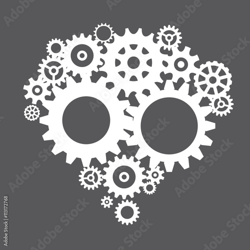 Grey illustration of sprockets.