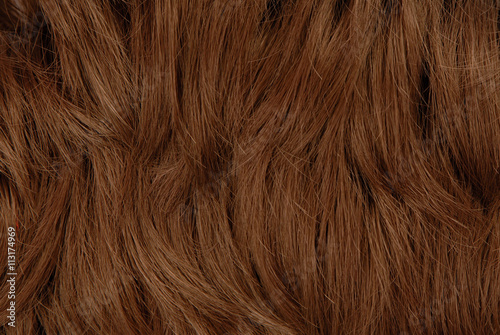 brown artificial hairs, textured background photo