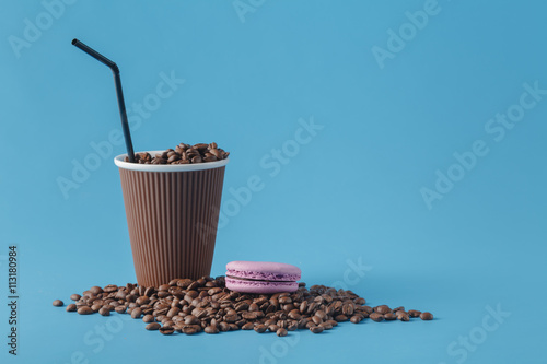 Paper cup on blue background photo