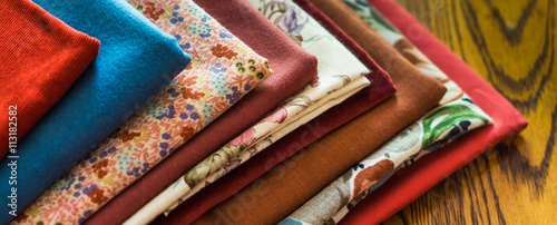 stash of fabrics for fall sewing projects 
 photo