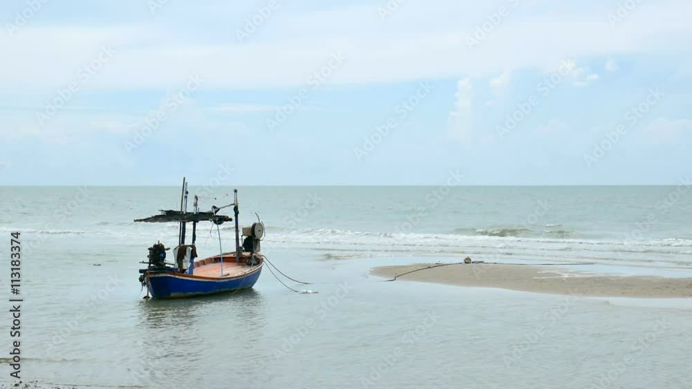 local fisherman boat moor at the beach when Low tide time cha-am thailand local fisherman boat moor at the beach when Low tide time cha-am thailand