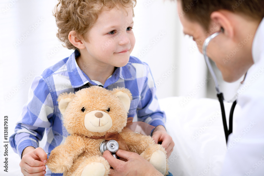 Doctor examining a child patient by stethoscope Doctor examining a child patient by stethoscope