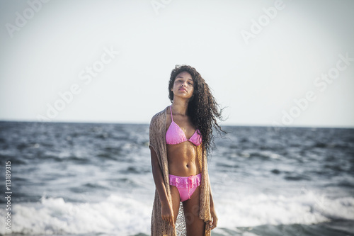 Portrait of girl (12-13) on beach