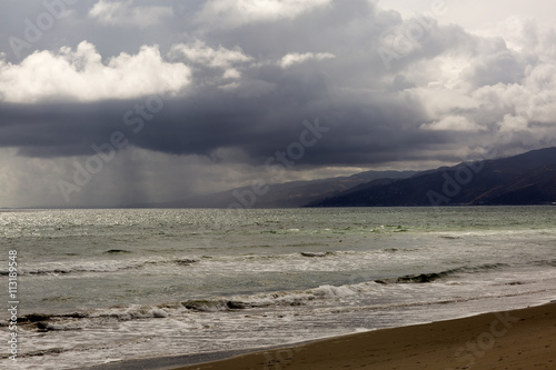 Pacific ocean during a storm. Beach landscape in the U.S. in bad weather. The ocean and waves during strong winds in United States  Santa Monica.