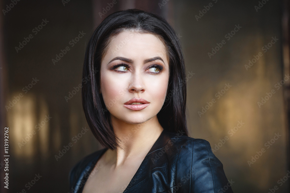 Beautiful young girl in a leather jacket Beautiful young girl in a leather jacket