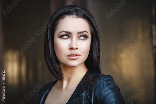 Beautiful young girl in a leather jacket © Petrov Denis