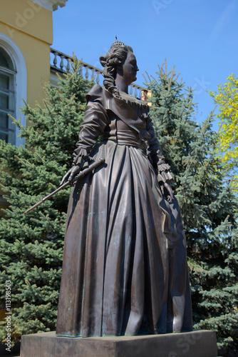 The sculpture of Catherine II closeup. The monument in front of the administration of the city of Novorzhev, Pskov region, Russia