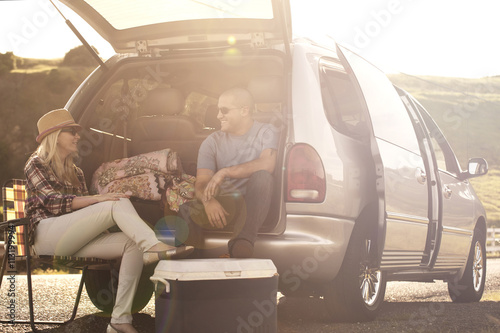 Young people camping by car photo
