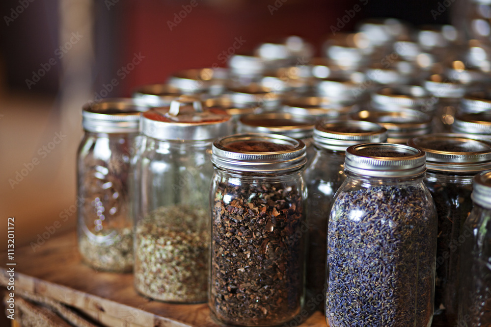 Jars with dried herbs and spices Jars with dried herbs and spices