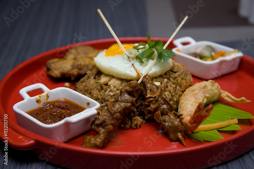 Delicious Fried Rice with Satay and Egg Topped with Sambal Sauce