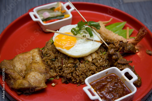 Delicious Fried Rice with Satay and Egg Topped with Sambal Sauce