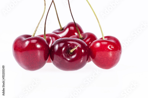 some fruits of red cherry isolated on white background