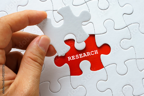 White puzzle with word RESEARCH