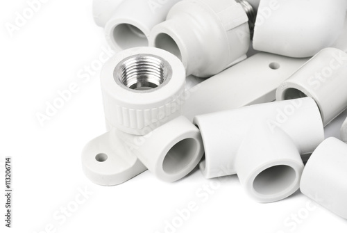 Fitting - PVC connection coupler to connect polypropylene tubes, isolated on a whiter