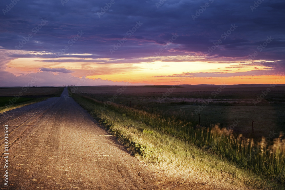 Scenic view of road against cloudy sky Scenic view of road against cloudy sky