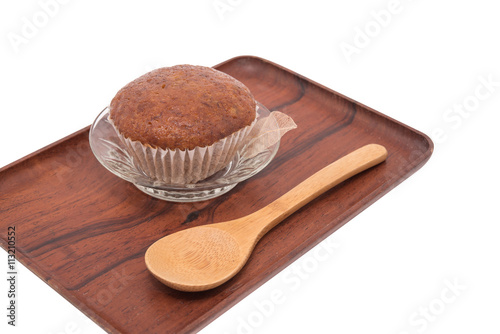 Banana muffin cake on wooden tray isolated on white background