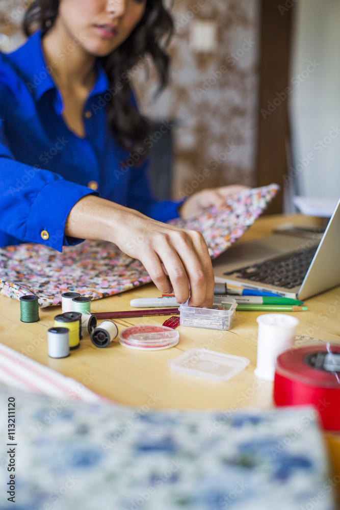 Fashion designer working in office