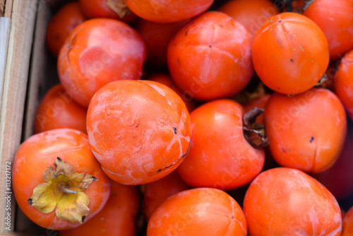 Fotografi Fresh Persimmon kaki fruits