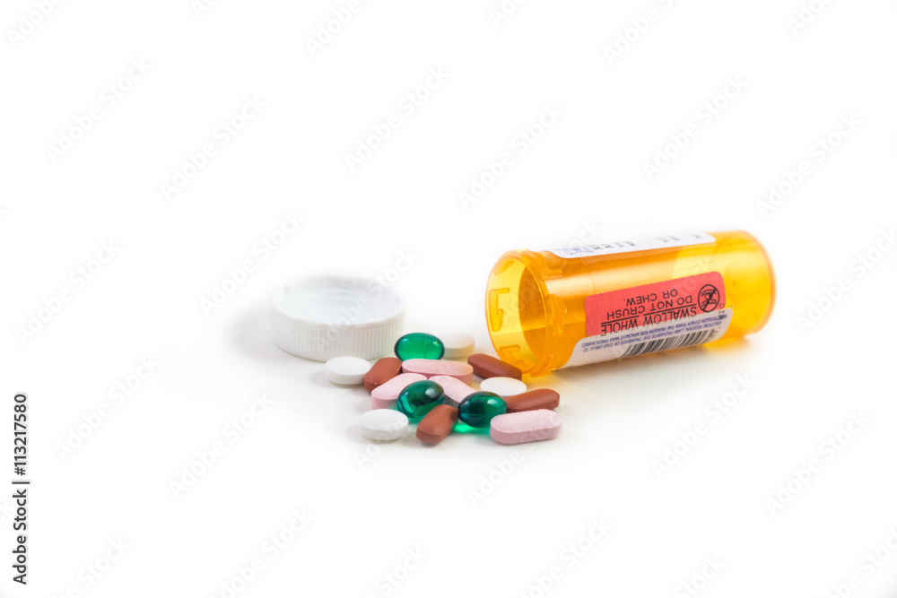 Mixed pills with medicine bottle. Mixed pills with medicine bottle.