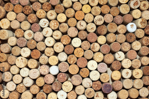 Background of used wine corks, wall of many different wine corks closeup