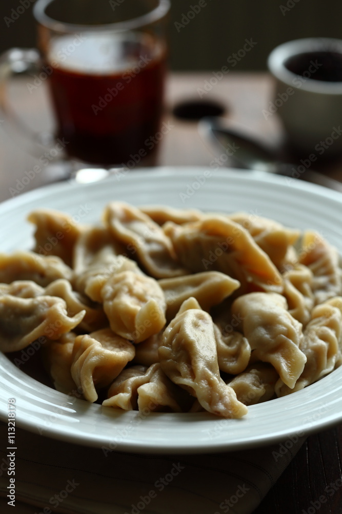 caucasian food with butter sauce in a dark mood
caucasian food with butter sauce in a dark mood