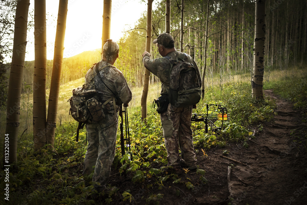 Two hunters in forest Two hunters in forest