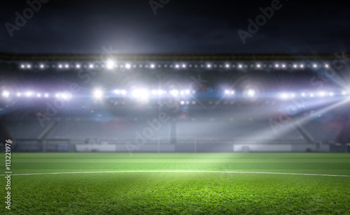 Fototapeta Naklejka Na Ścianę i Meble -  Football stadium in lights