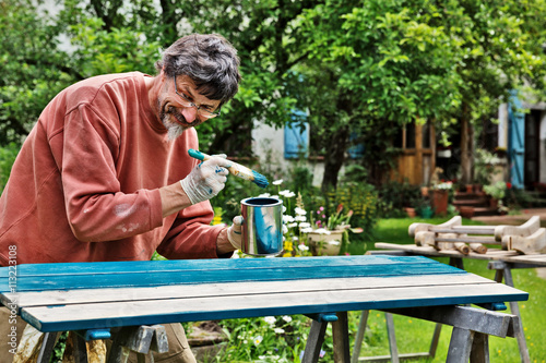 Painting an Outdoor Bench photo