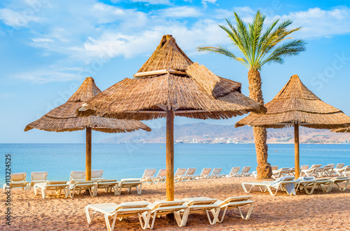 Relaxing facilities on central beach of Eilat - famous resort and recreation city in Israel