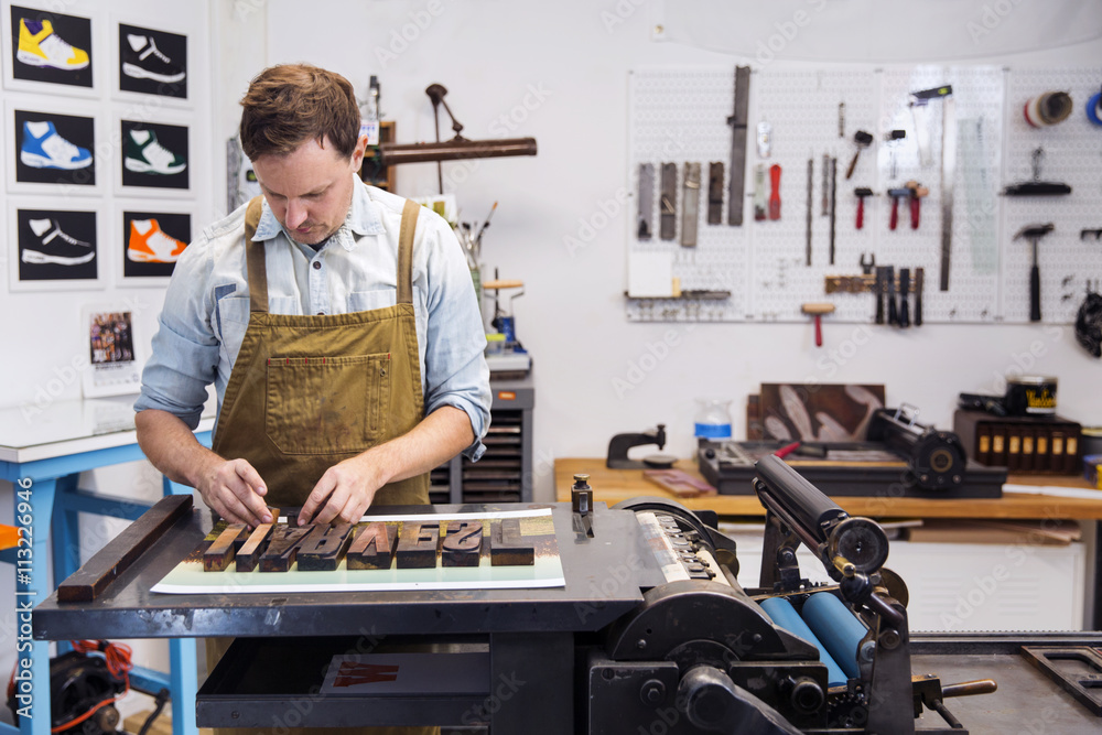 custom made wallpaper toronto digitalMan assembling text in print shop