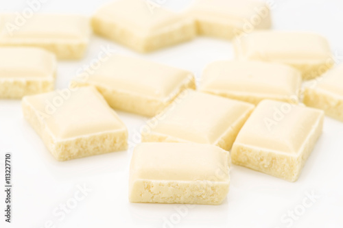 small pieces of white chocolate on white