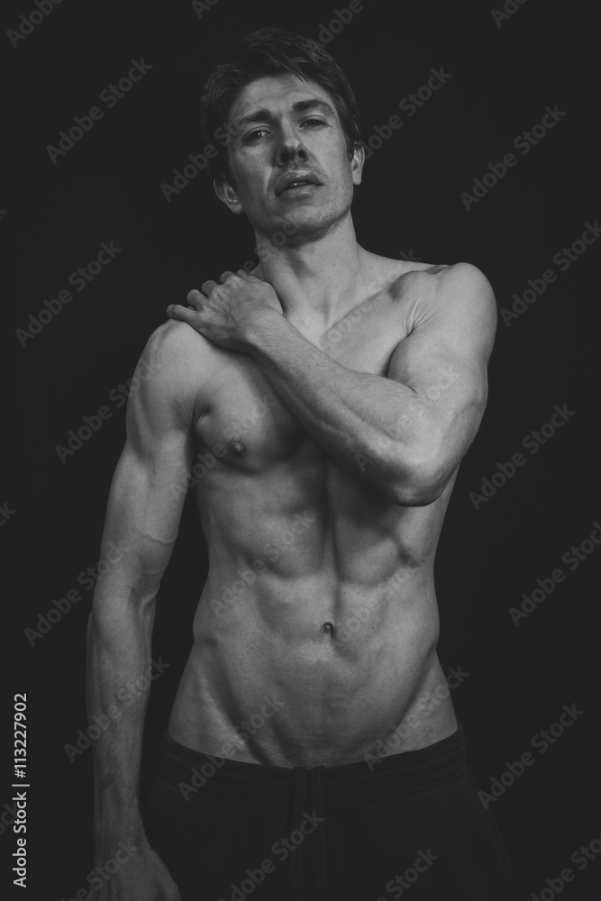 Portrait of a Muscular man in a studio Portrait of a Muscular man in a studio