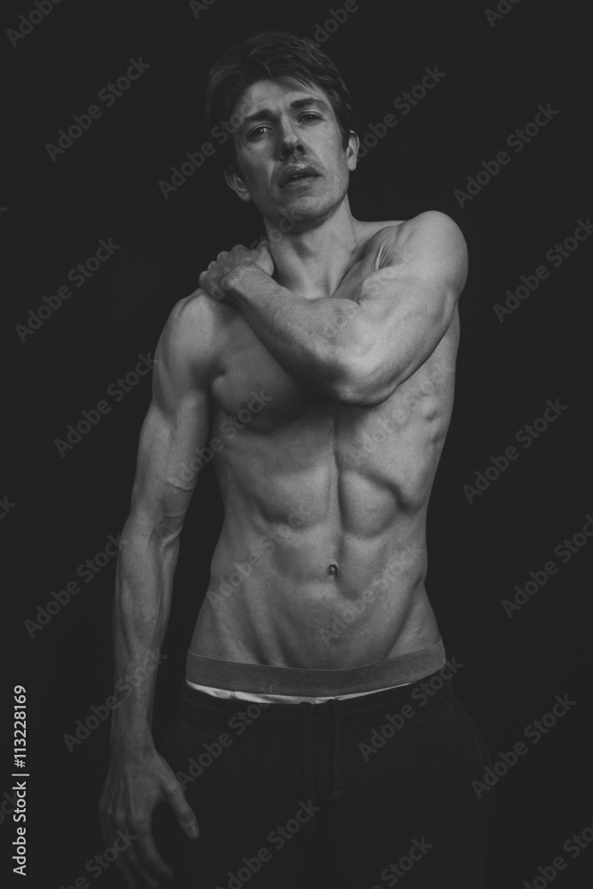 Portrait of a Muscular man in a studio Portrait of a Muscular man in a studio