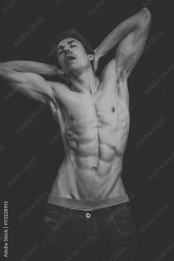 Portrait of a Muscular man in a studio Portrait of a Muscular man in a studio