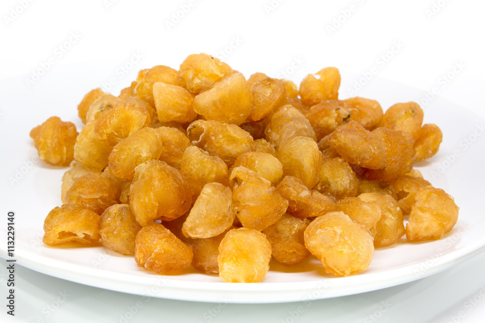 dried longan fruit on white background