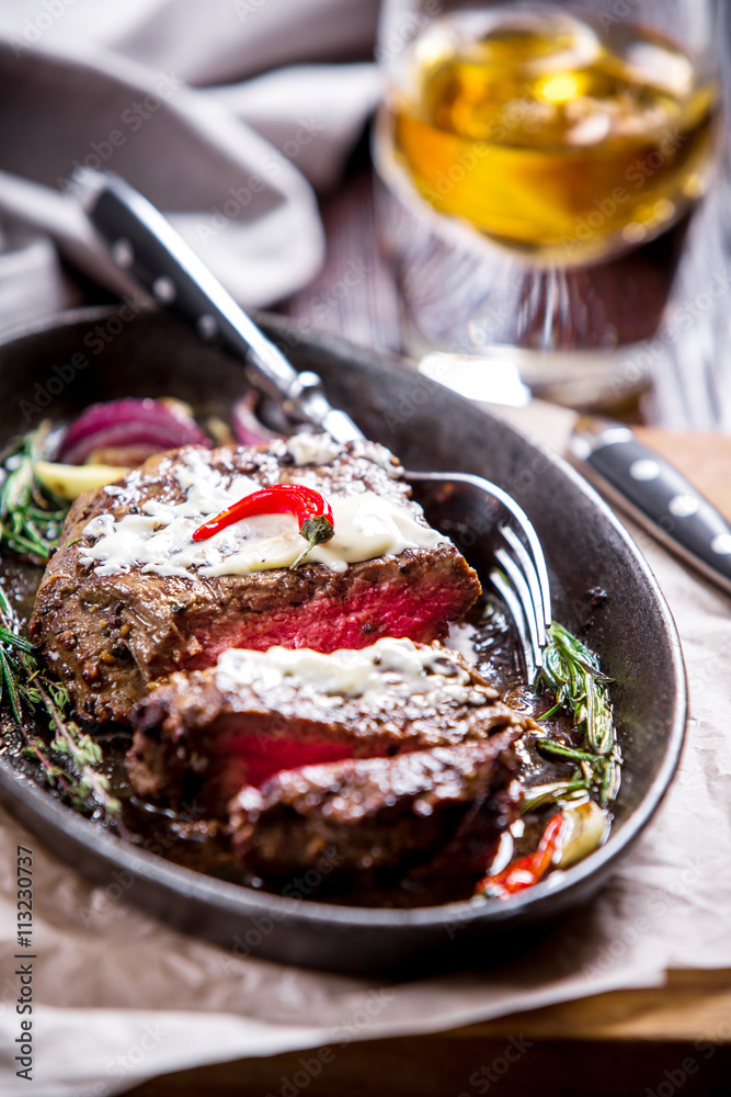 Healthy lean grilled medium-rare steak and vegetables Healthy lean grilled medium-rare steak and vegetables